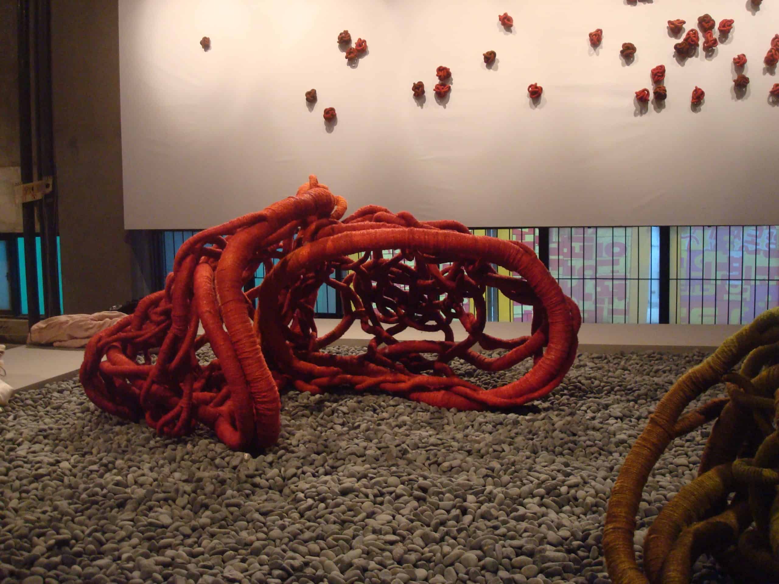 red linen sculptures at Cheongju International Craft biennale, Korea by Aude Franjou