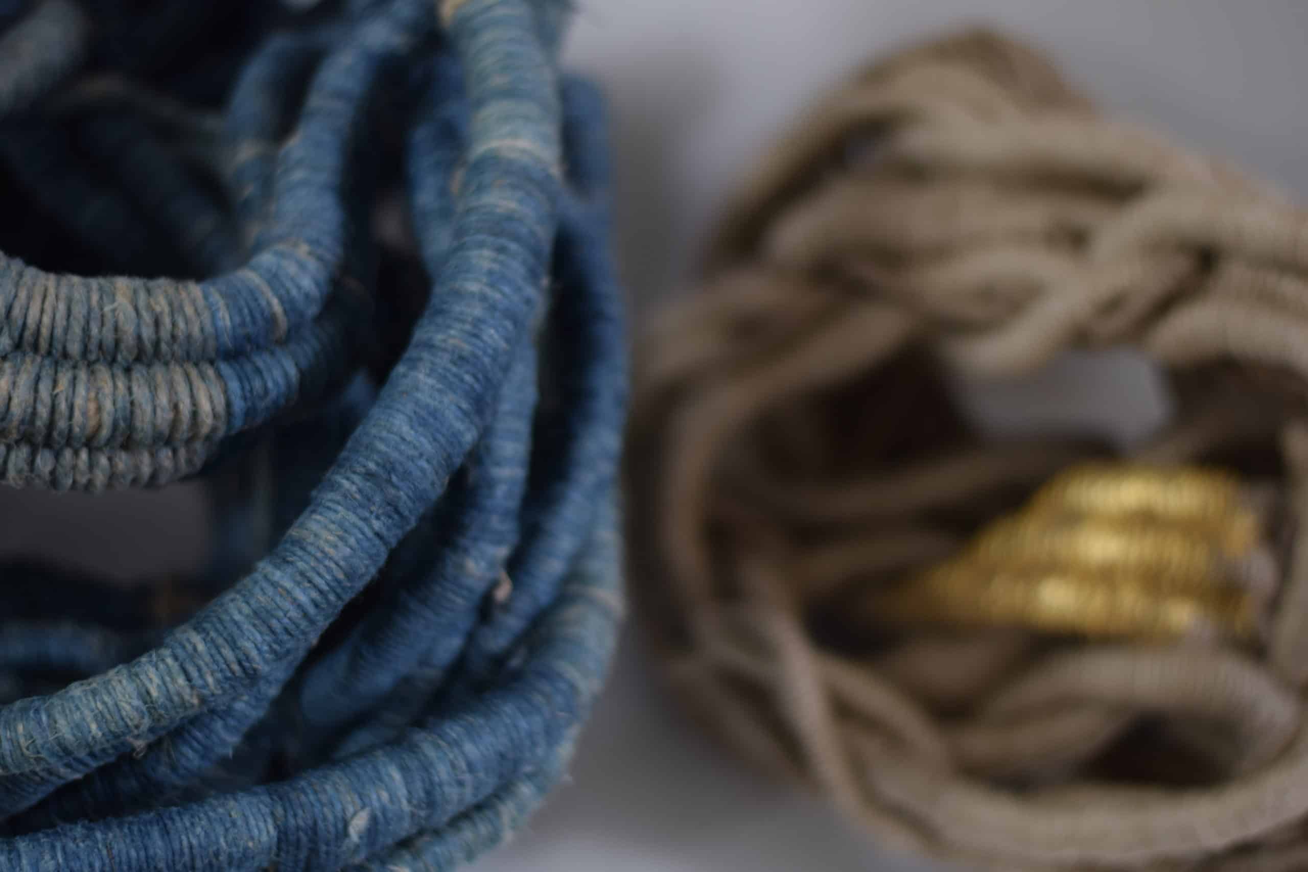 indigo undyed and gold sculpture by Aude Franjou