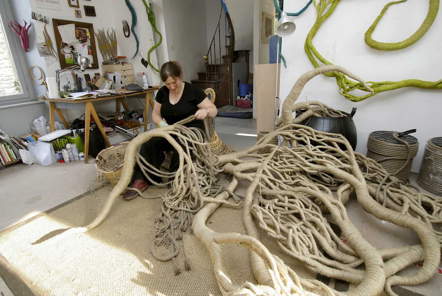 Aude Franjou at work sculpting a giant piece in her workshop