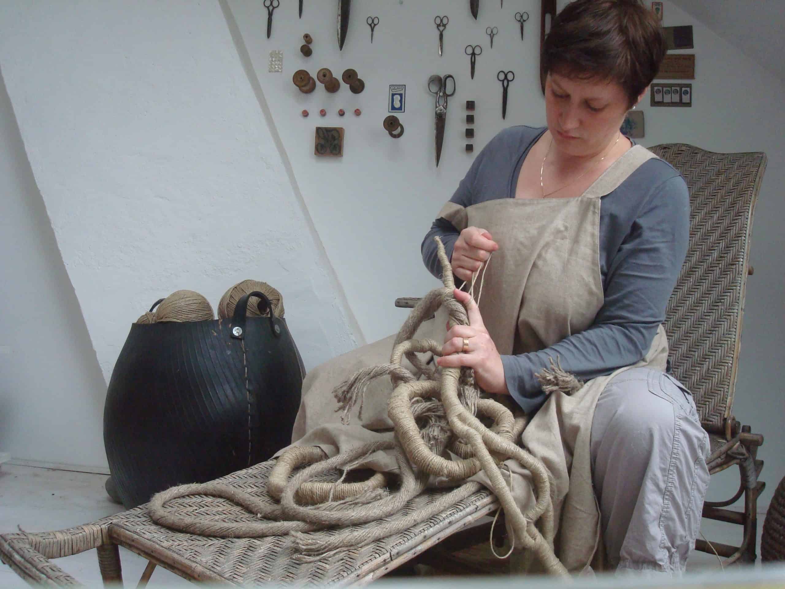 Picture of contemporary artist Aude Franjou at work sculpting in her workshop