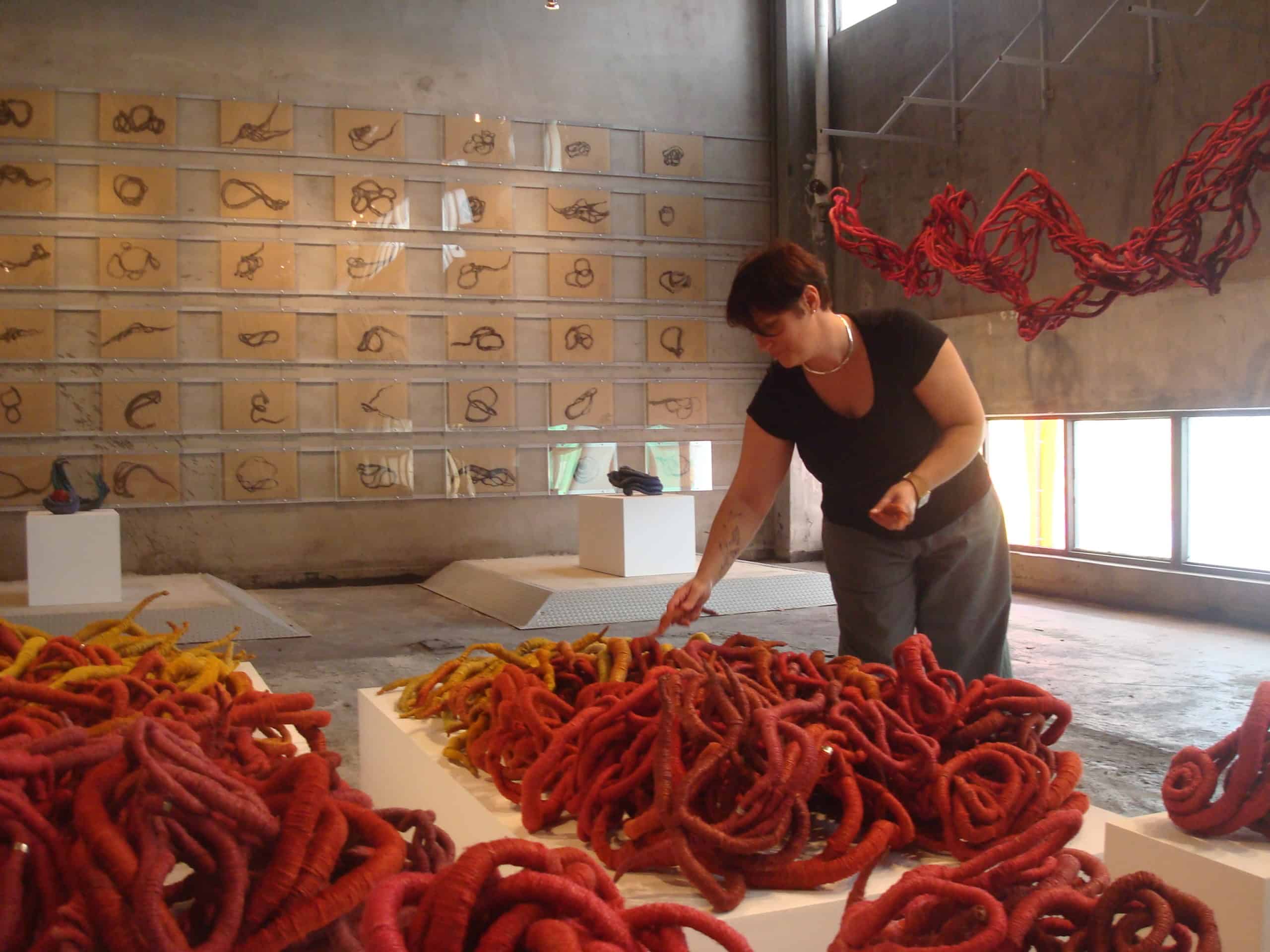 Sculptor Aude Franjou is preparing an exhibition of red sculptures and drawings