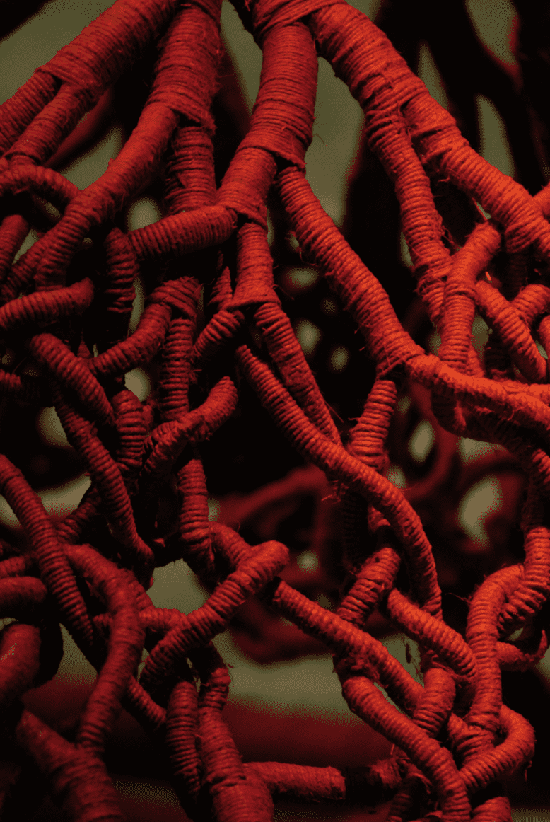 close-up on red sculpture by Aude Franou, textile museum in Chollet, France